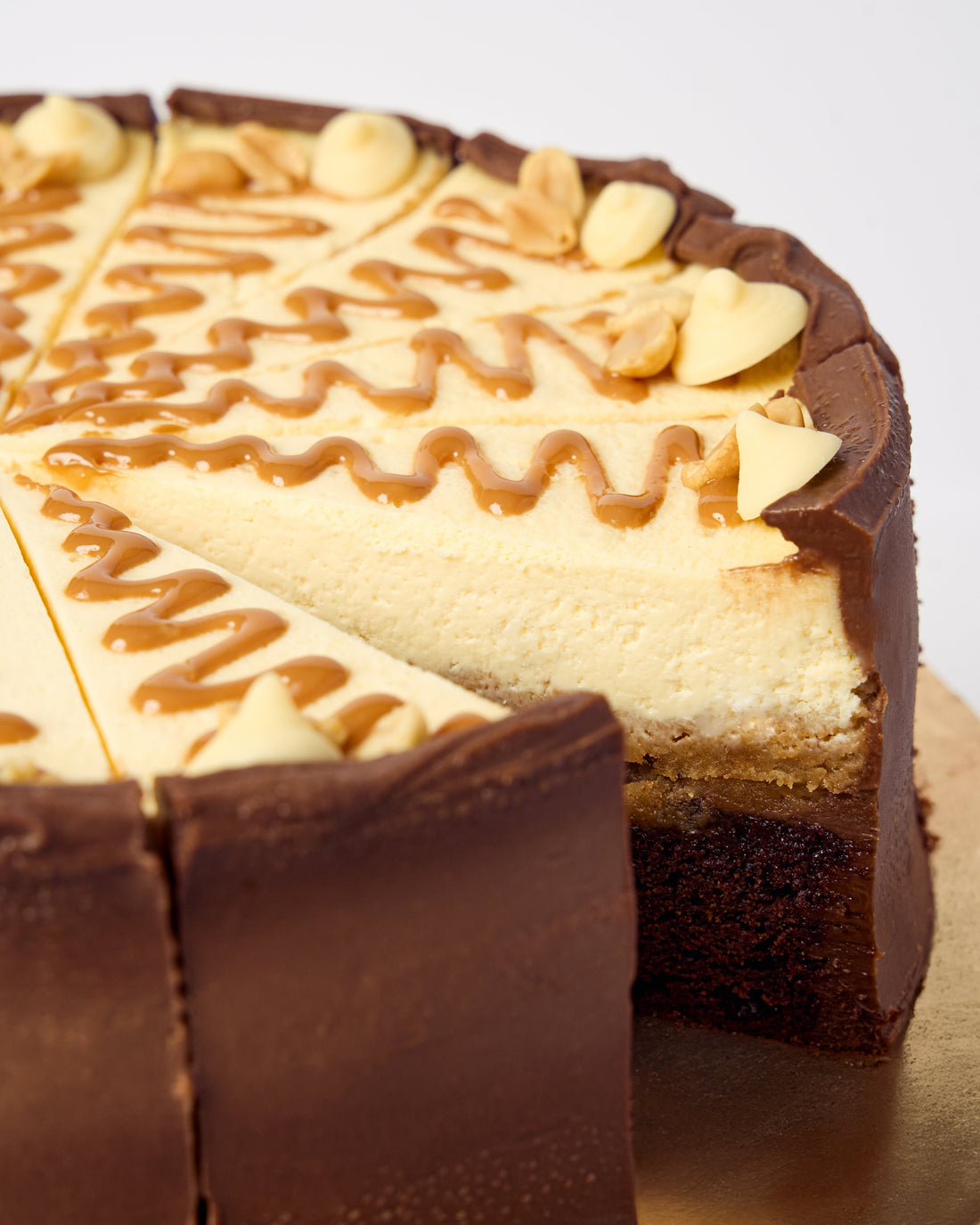 Hele taart | White Snickers Cheesecake
