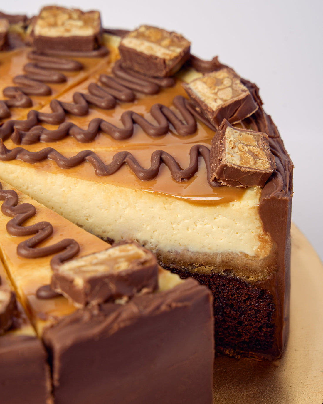 Hele taart | Snickers Brownie Cheesecake