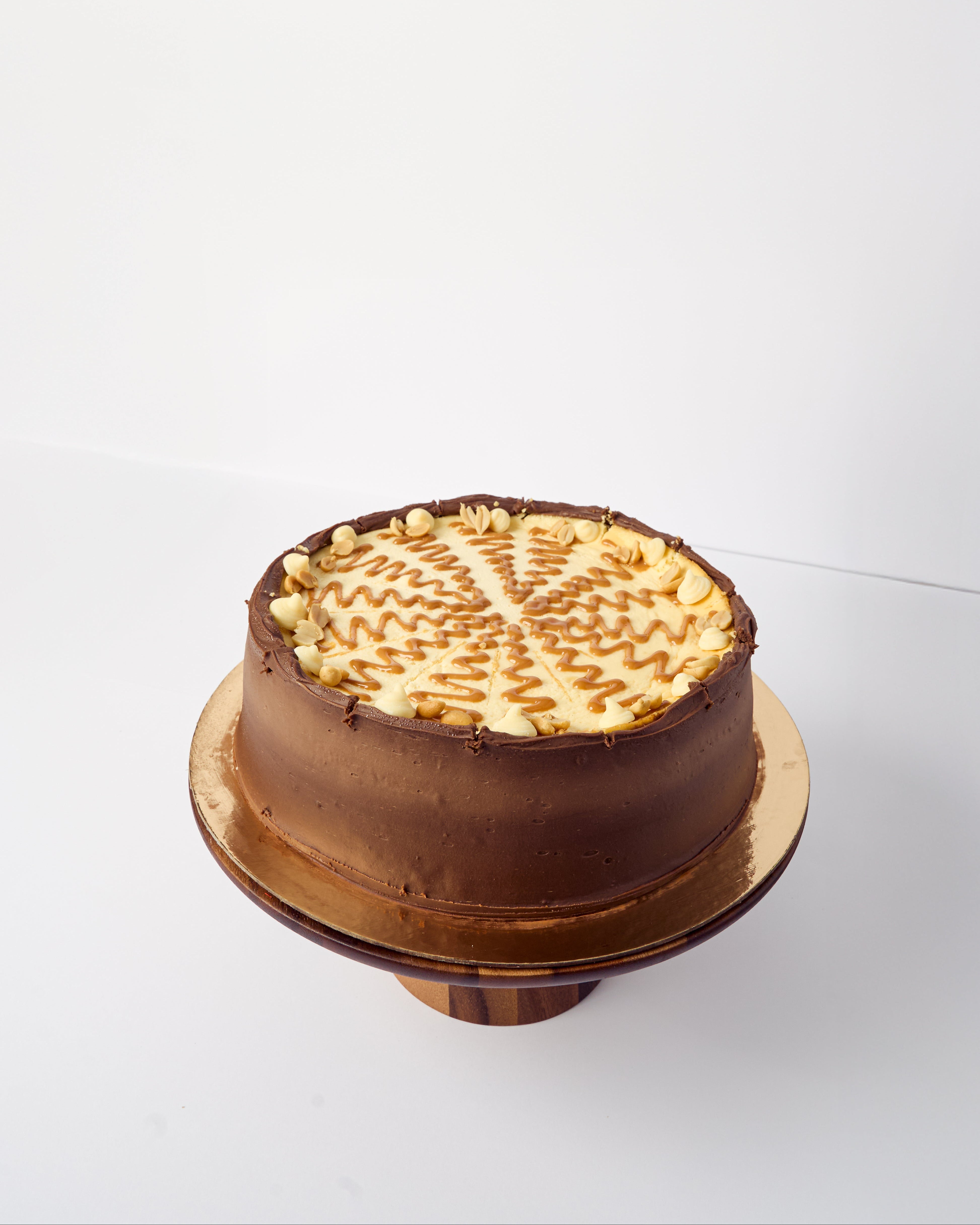 Hele taart | White Snickers Cheesecake
